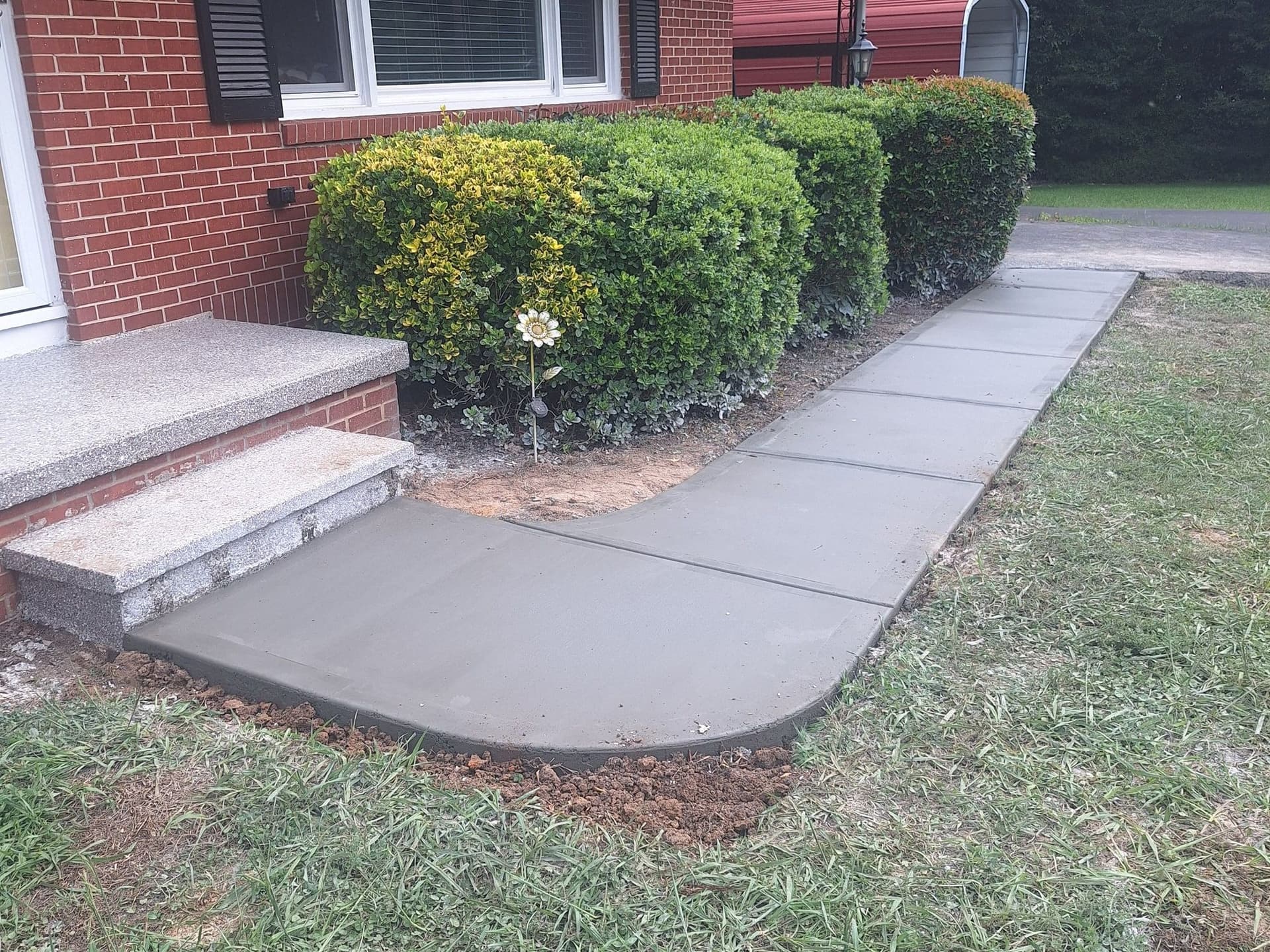 Concrete Sidewalks by Hawk Concrete LLC